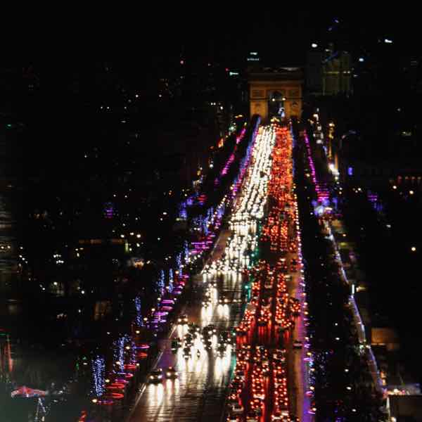 Driving down the Champs Elysée in Paris, France. J Chung
