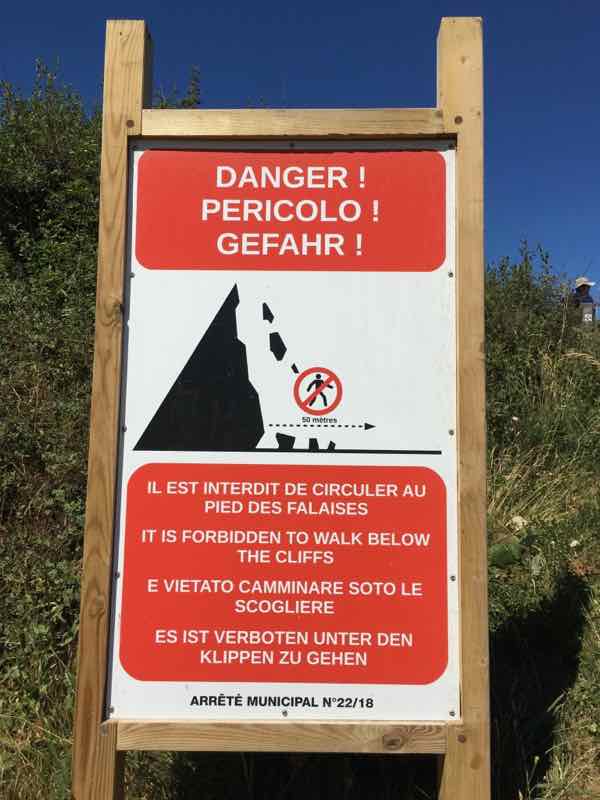 Etretat cliff warning sign