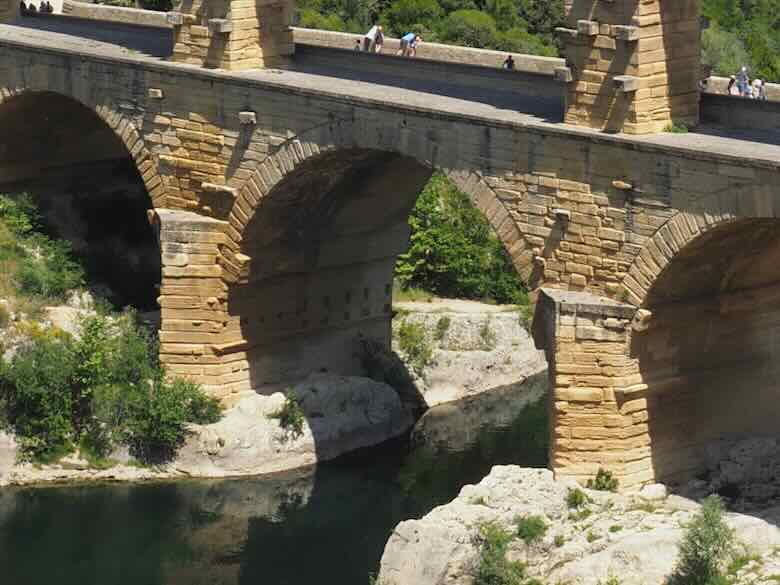 One arch of Pont du Gard straddles the Gardon River
