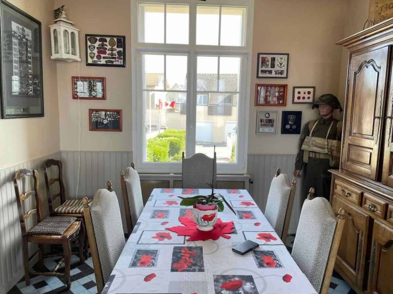 Dining room with artifacts from World War II at Canada House