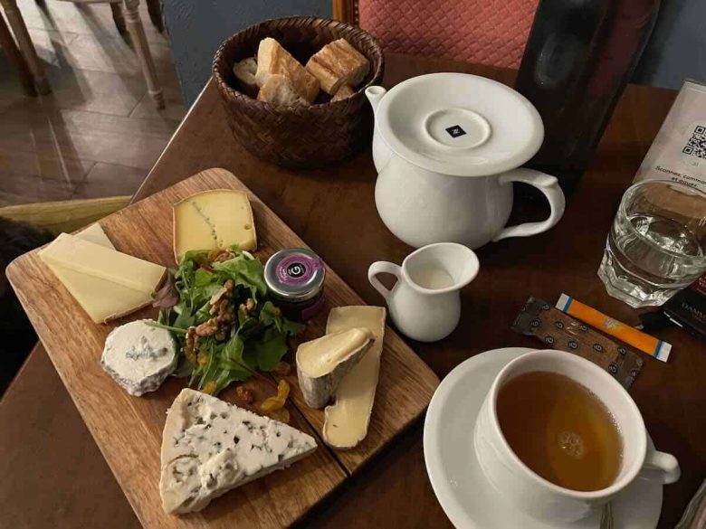 Tea and cheese plate at Cafe des Chats, Paris